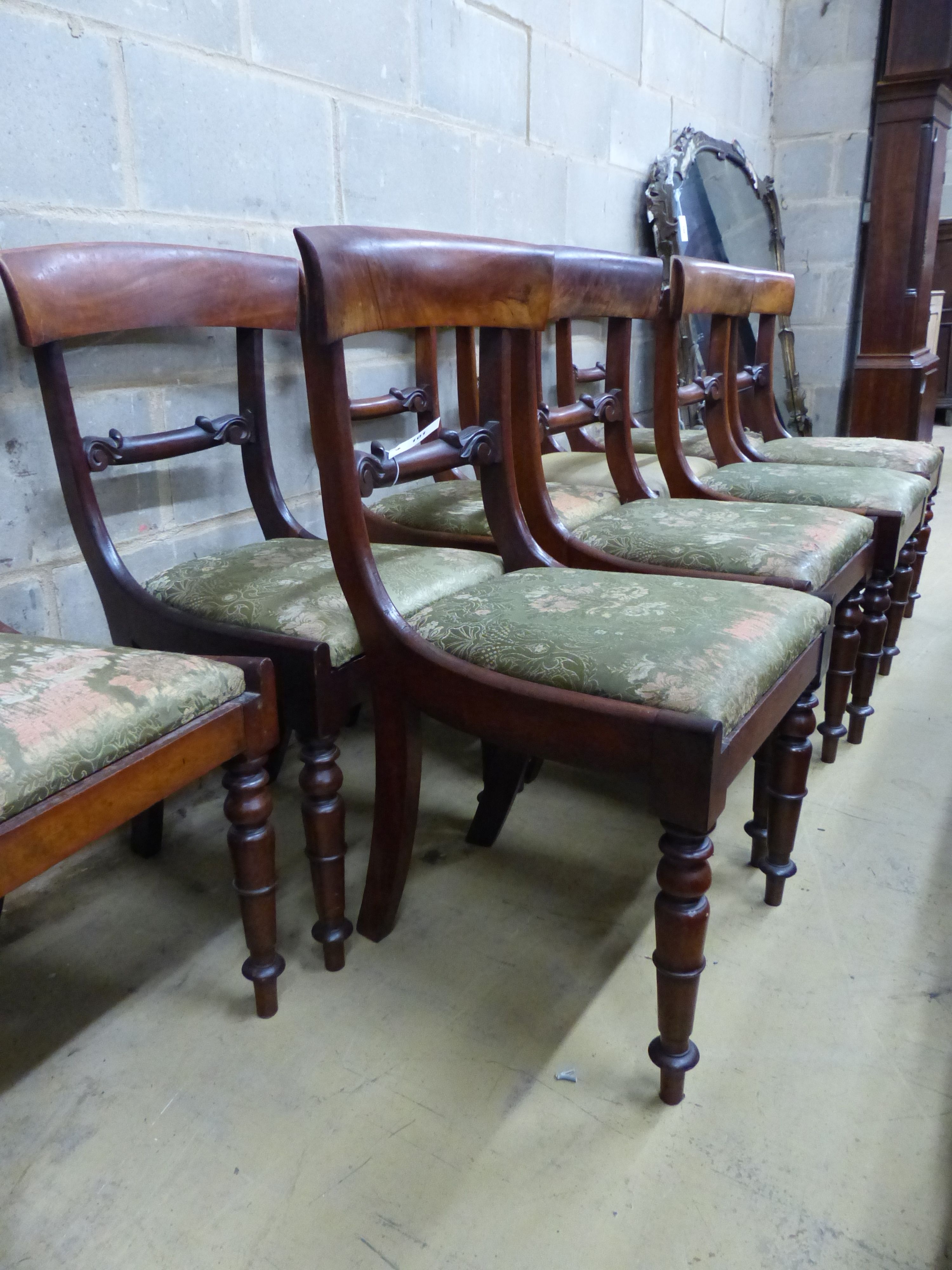 A set of nine early William IV mahogany dining chairs